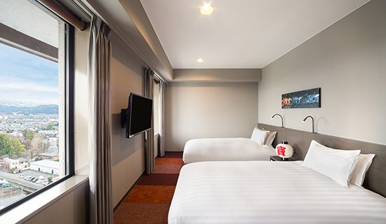 Standard Room: Two single beds, mountain view